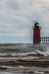 Obraz premium Michigan Light House Large Waves Evening, room for copy