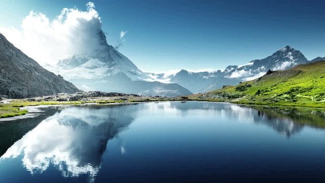 Reflection of Matterhorn in lake Riffelsee, Zermatt, Switzerland