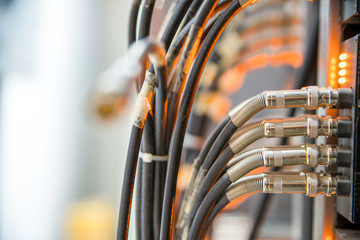 network cables connected to a switch and patch-panel,internet concept background,symbol of global communications