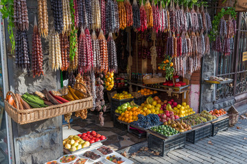 Churchkhela is a traditional Georgian candle-shaped candy. The main ingredients are grape must, nuts and flour dipped in thickened grape juice or fruit juices and dried in the shape of a sausage.