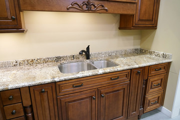 Close up on stainless steel kitchen sink