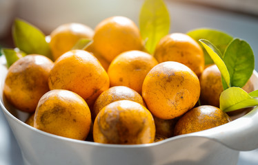 Closeup tangerines in basket
