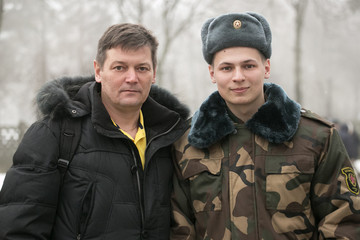 Fototapeta premium Belarusian young soldier. Soldier with father