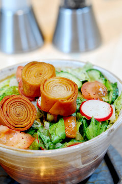 A delicious bowl of fatosh salad with olive oil
