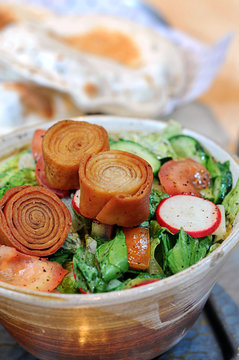 A delicious bowl of fatosh salad with olive oil