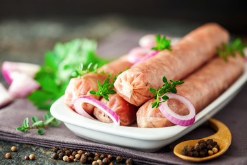 Kupaty - raw shashlik sausage of pork barbecue, grill. Raw sausage for grill.  Picnic. Selective focus.