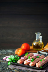 Kupaty - raw shashlik sausage of pork barbecue, grill. Raw sausage for grill.  Picnic. Selective focus.