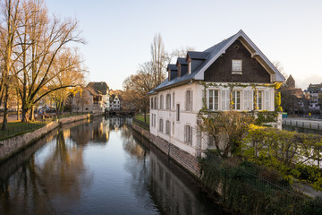 Fototapeta na wymiar Morning house on river in La Petit France Quarter, Strasbourg (France)