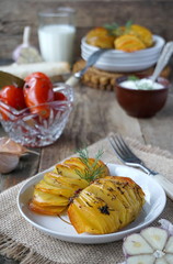 Baked potatoes with garlic and dill