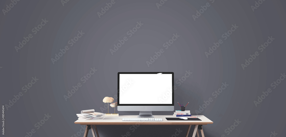 Wall mural computer display and office tools on desk.