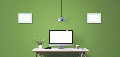 Computer display and office tools on desk.