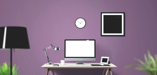 Computer display and office tools on desk.