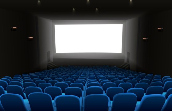 Cinema auditorium with blue seats and white blank screen