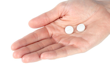 pills in woman hand