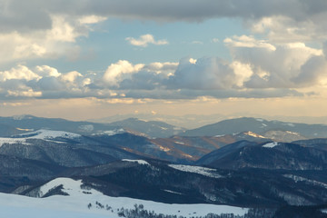 Soaring above the clouds - beautiful winter landscape on a mountain top
