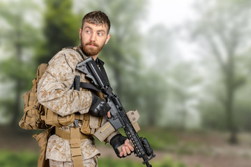 Fototapeta premium Soldier with rifle