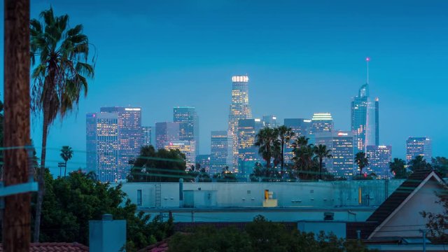 Downtown City of Los Angeles skyline changing from dusk to night. 4K timelapse