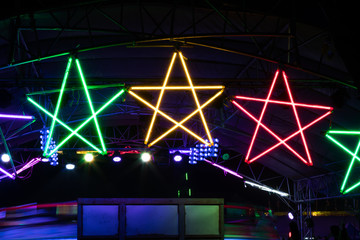 Colorful star light bulb at night.