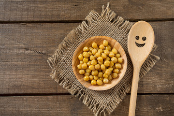 chickpeas on wooden surface