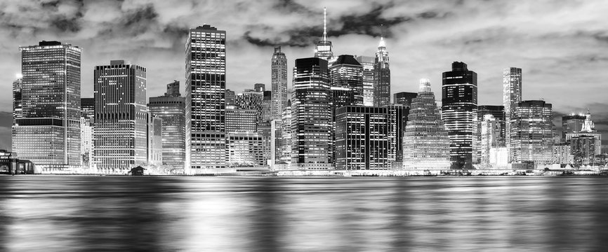 Fototapeta Black and white New York City skyline at night, USA..