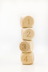 Wooden blocks are sorted in ascending order on vertical.