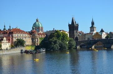 Fototapeta na wymiar Prague - Charles Bridge and St. Nicholas Church