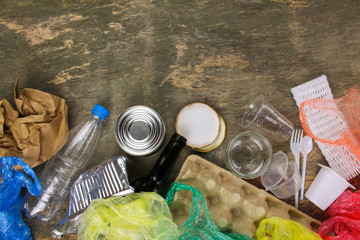     Closeup of waste on old wooden background. Top view. 