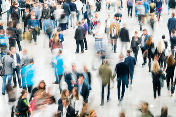 blurred people in a modern hall