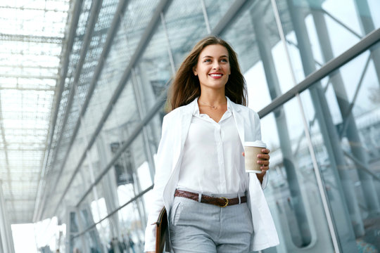 Beautiful Woman Going To Work With Coffee