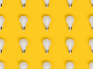 full frame of arrangement of light bulbs isolated on yellow