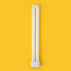 close up view of white light bulb isolated on yellow