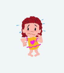 White girl in a swimsuit points angrily to his left.