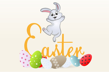 happy Easter. funny Bunny jumping over the painted eggs.