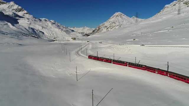 Bernina express, unesco heritage in the Swiss Alps. Red Train of Bernina