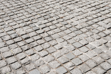Vintage stone street road pavement texture, outdoor