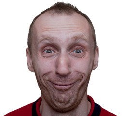 Portrait of unshaven caucasian man with funny face. Positive emotions. Play the ape. Close-up portrait. Isolated on white.