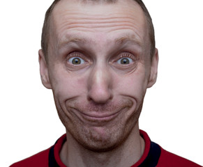 Portrait of unshaven caucasian man with funny face. Positive emotions. Play the ape. Close-up portrait. Isolated on white.