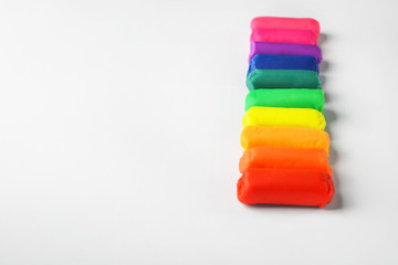 Rainbow play dough on white background