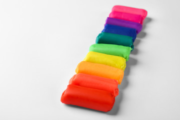 Rainbow play dough on white background