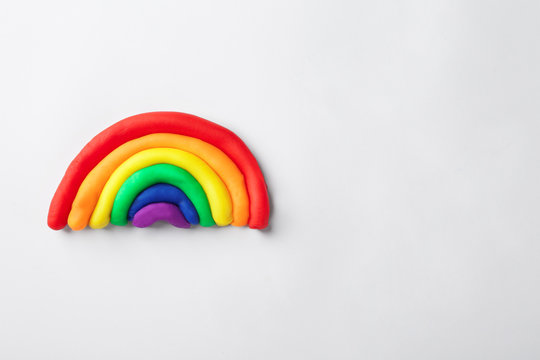 Plasticine rainbow on white background