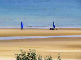 Omaha Beach, Normandy, France. Sail Karts on the Omaha Beach. Omaha is famous for the Normandy...