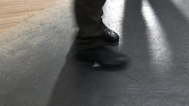 Dancer's feet close up. Feet tap-dancers. Dancing shoes closeup.Tap dance.