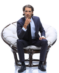 businessman sitting in a comfortable big chair