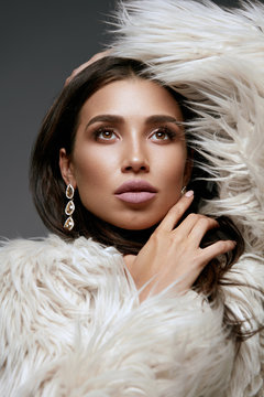 Fashion. Woman With Beauty Makeup In Fur