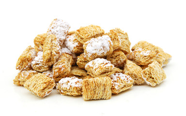 Breakfast setting with frosted wheat cereal in wood bowl