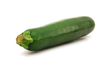 Fresh green zucchini isolated on white background