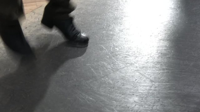Dancer's feet close up. Feet tap-dancers. Dancing shoes closeup.Tap dance.