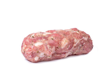 raw pilota, a long meatball typical of Catalonia