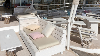 Outdoor restaurant by the beach in Perissa Santorini Greece