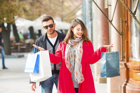 Couple enjoying shooping outdoors